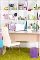 Workplace with laptop, close up