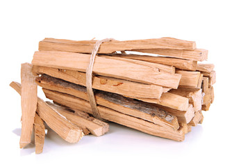 Stack of firewood isolated on white