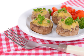 Stuffed mushrooms on plate on table close-up