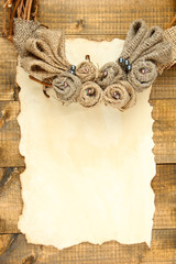 Old paper sheet and beautiful rustic wreath,