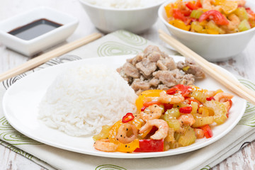 Chinese food - rice, chicken and vegetables with shrimp
