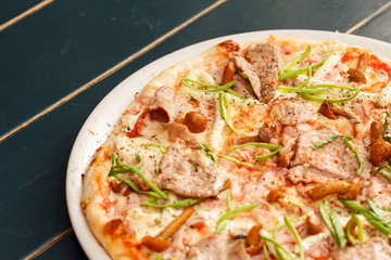 pizza with beef and mushrooms