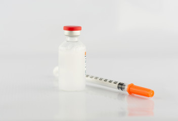Disposable syringe and insulin vial