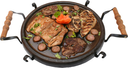 Traditional food with pork and chicken meat grilled on plate