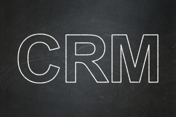 Obraz premium Business concept: CRM on chalkboard background