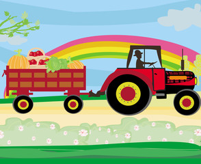 man driving a tractor with a trailer full of vegetables