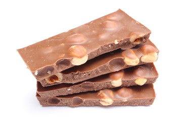 Closeup of chocolate pieces on white background