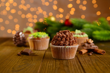 Tasty cupcakes with butter cream,