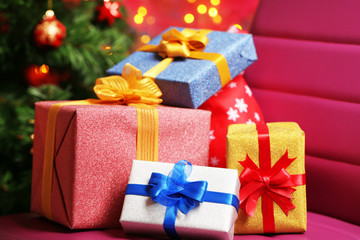 Christmas gift boxes on Christmas tree background