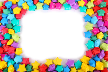 Paper stars with dreams on white background