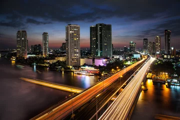 Foto auf Acrylglas Traffic in modern city, Chao Phraya River,  Bangkok, Thailand. © pipop_b