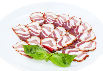 bacon, onion and pepper on a plate in a restaurant