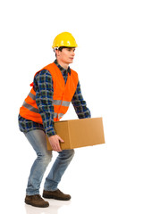 Crouching with a heavy package.