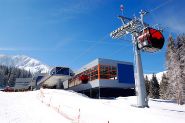 The cableway station at popular ski resort and slope