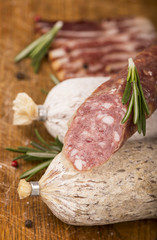 Smoked sausage with rosemary and peppercorns tomatoes and garlic