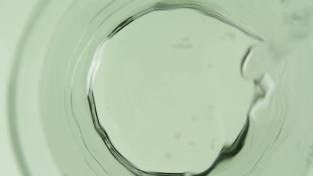 Pill Dissolving in Water Bibbling Closeup