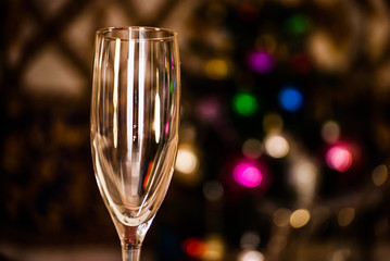 glasses with defocused christmas tree in background