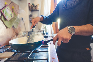 close up of hands cooking