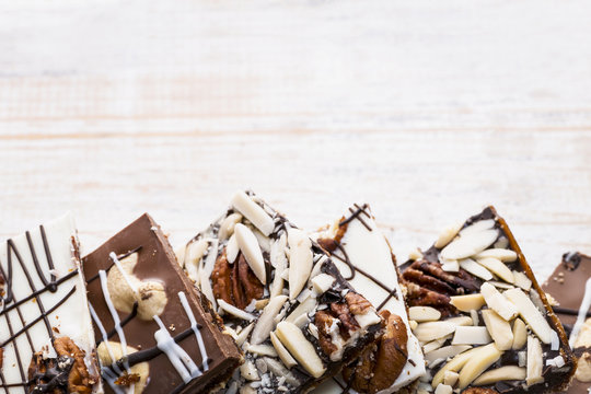 Chocolate Bark On Wood Background