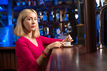 woman with a cup of coffee