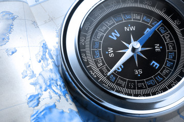 Compass on map background