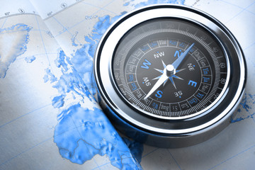 Compass on map background