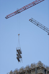 Naklejka premium Construction site with crane and building