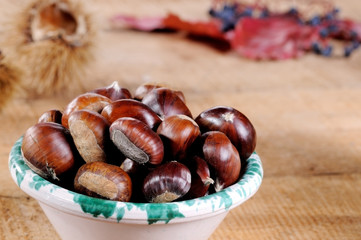 chestnuts on wood