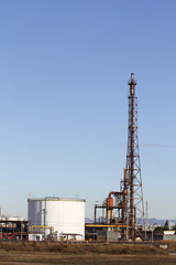 Fototapeta na wymiar High tower in a refinery