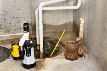 Replacing the old sump pump in a basement - 59626050
