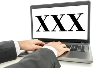 XXX written on laptop monitor