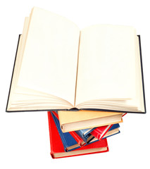 open book on top of stack of books