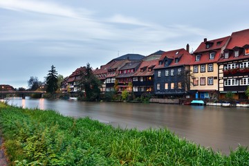 Fototapeta na wymiar River and exteriors of houses in Bamberg, Germany.