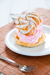 Delicate puff profiterole filled with delicious cream