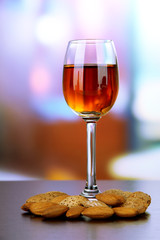 Glass of amaretto liquor and roasted almonds,