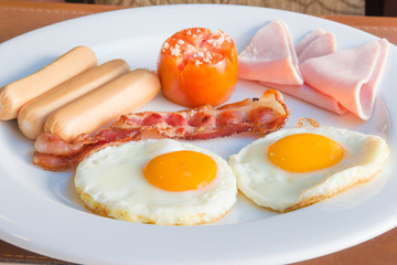 Traditional breakfast eggs with ham
