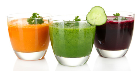 Fresh vegetable juices isolated on white