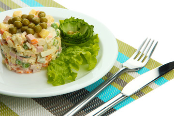 Russian traditional salad Olivier, isolated on white