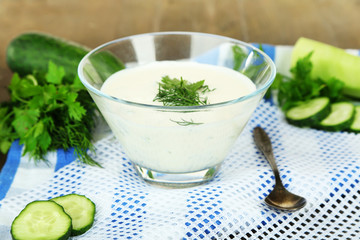 Cucumber yogurt in glass bowl,