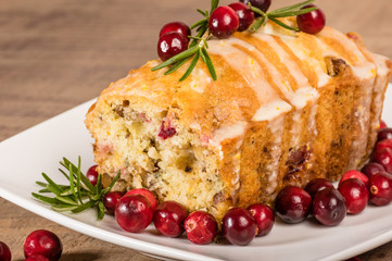 Cranberry walnut bread on a white plate