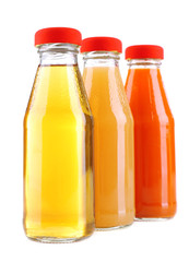 Baby food (juices) in glass jars, isolated on white
