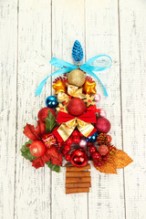 Christmas tree of Christmas toys on wooden table close-up