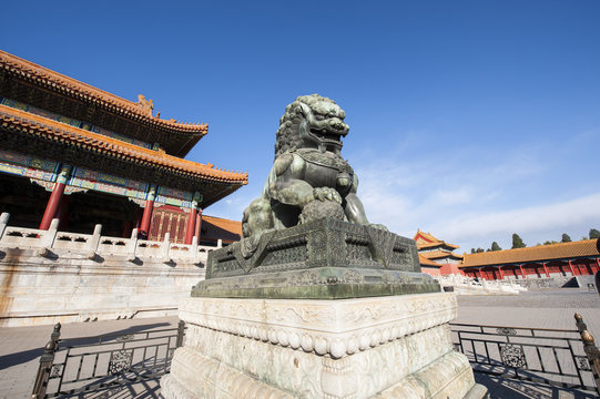 A bronze lion of Forbidden City in Beijing, China.