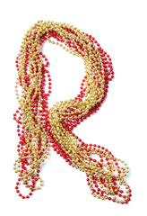 Letter r of red and gold beads