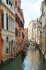 Fototapeta na wymiar gondola on the narrow canals of Venice, Italy, Europe