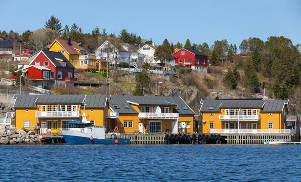 Norwegian Fishing Village With Wooden Houses On The Sea Coast