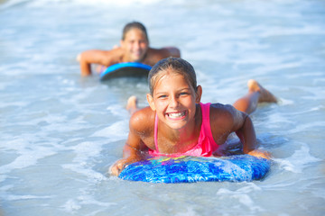 Summer vacation - surfer girls.