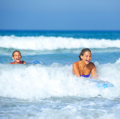 Summer vacation - surfer girls.