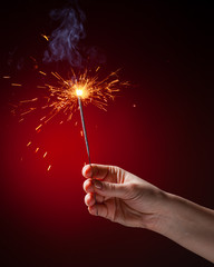 sparkler in hand
