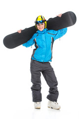 Full length shoot of young female snowboarder.